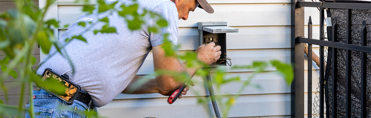 A Precision HVAC maintenance technician performing repairs